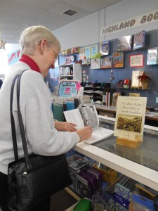 Janet, signing copies of her book at Highland Books in Brevard, NC.