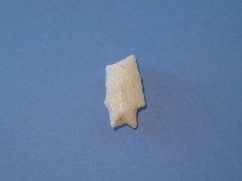 Late Archaic. Thin bioface straight-sided projectile broken in use or when re-sharpened. Good material.
