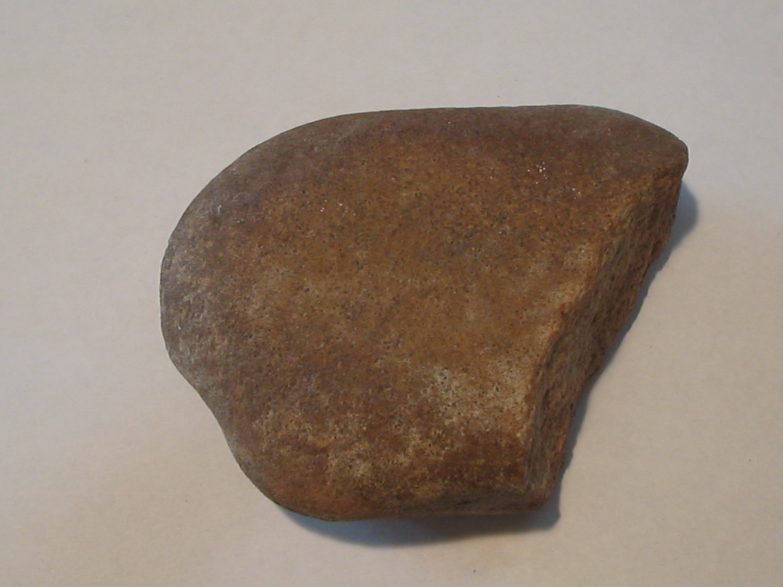 This is an anvil. Notice the slight depression in roughness in middle on one side.