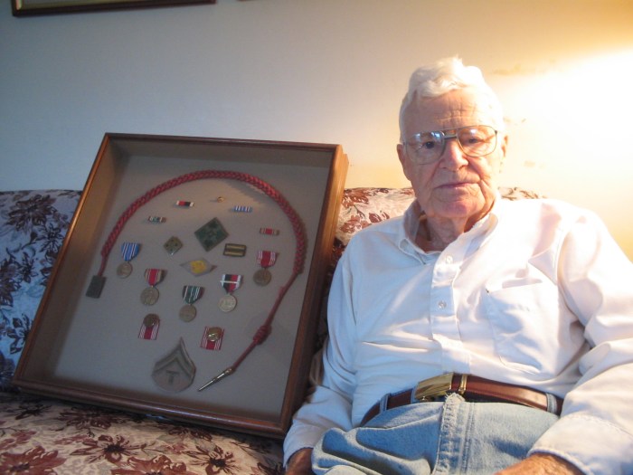 Photo of Mr. Ira Lee Taylor with his World War II medals in a frame on February 24, 2007.