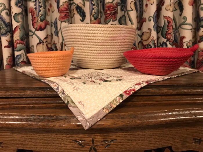 Photo of our white, red, and orange rope bowls that survived Hurricane Helene in Lansing, NC