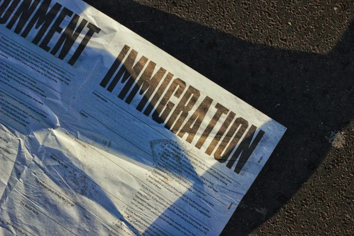 Photo of a paper with "Immigration" printed in bold capital letters