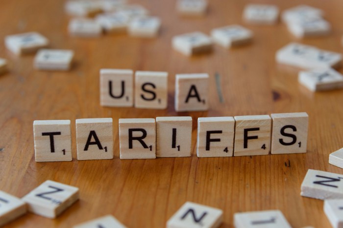 Photo of letters on wooden blocks spelling out: USA Tarriffs.
