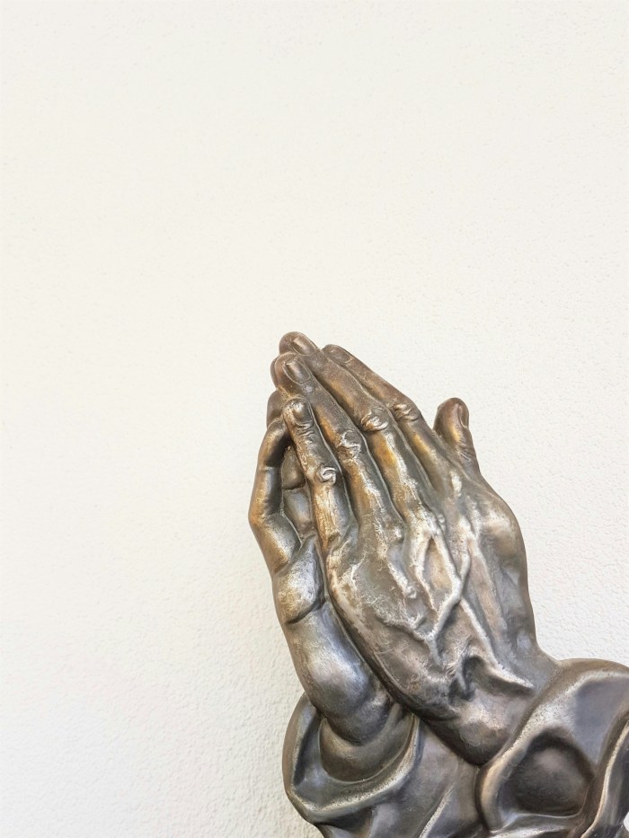 Photo of praying hands